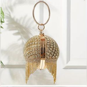 Round golden clutch bag